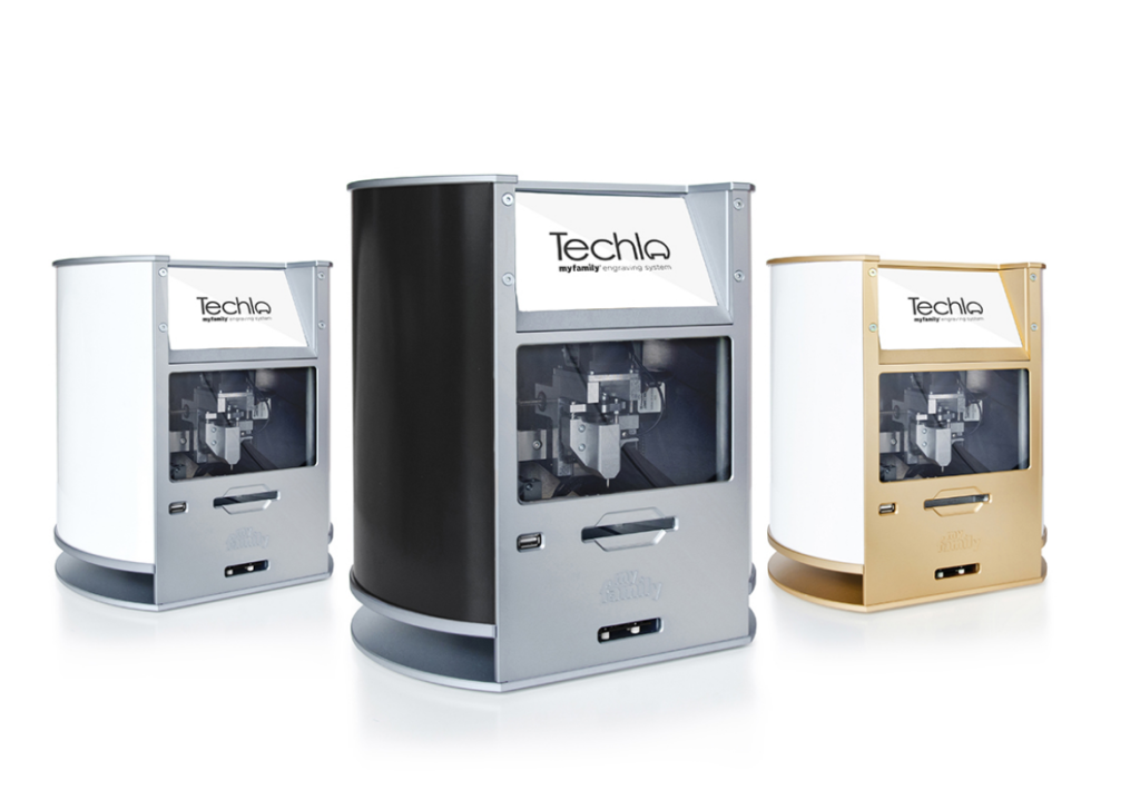 Three models of Techla engraving machine: white, black and gold