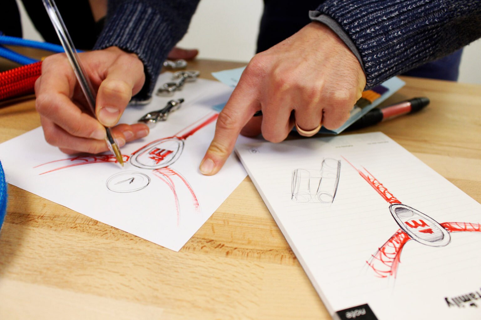 A designer creates the initial sketches of a Memopet leash.