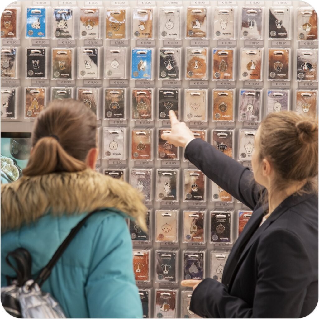 Two girls choosing their favorite ID tag